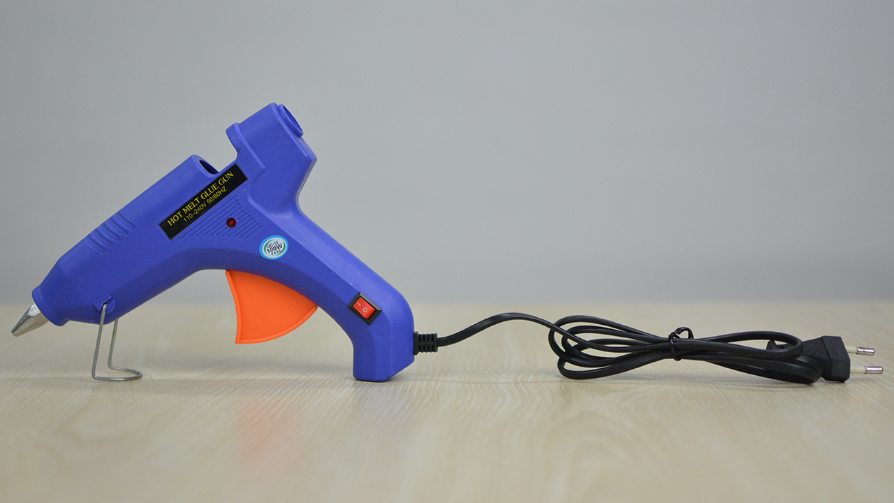 Blue Mini Hot Melt Glue Gun for Crafting and DIY Projects % Blue Mini Hot Melt Glue Gun for Crafting and DIY Projects