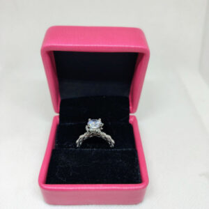 Brilliant Center Stone Twisted Band Women's Ring - Luminous Embrace Design